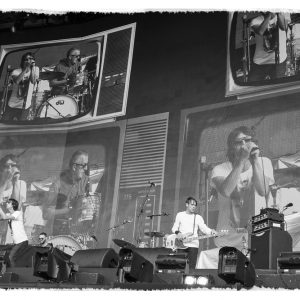 Festival stage with television streaming backdrop